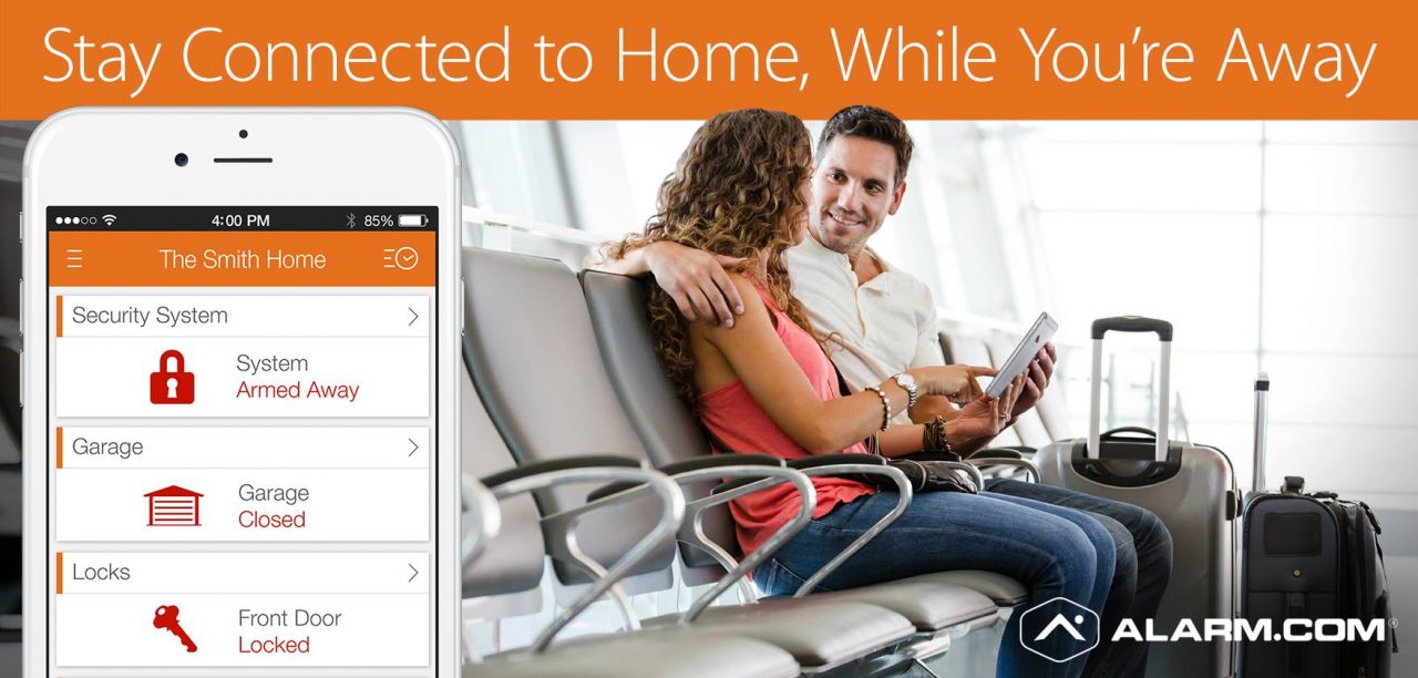 Alam.com banner, a smartphone with the alarm.com app running is facing forward on the left-hand side of the banner, the rest of the space is taken up by two people who appear to checking their alarm.com app as they wait at the airport. An orange rectangle runs the the length of the banner at the top and reads "stay connected to home, while you're away"